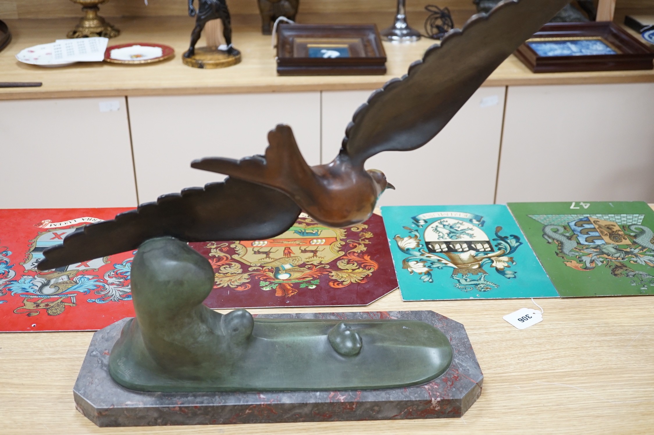 A large Art Deco bronze figure of a seabird, mounted on a marble base, signed Brault, 55.5 cms high